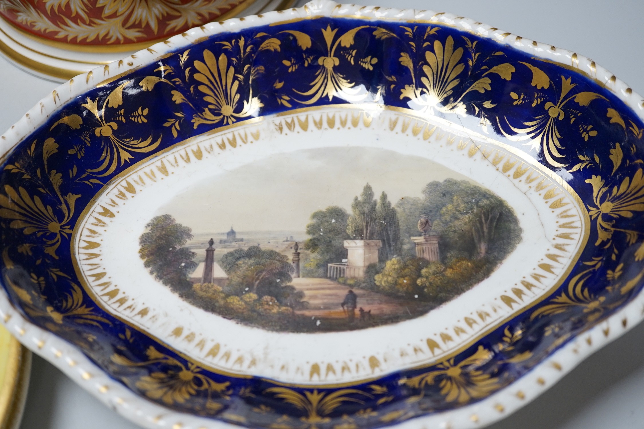 A small group of late 18th and 19th century Derby porcelain including bough pot, 23cm wide, dishes, plates, lidded pot and stand